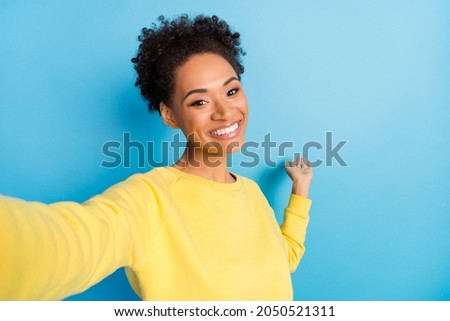 Photo of young happy joyful woman make selfie smile good mood isolated on blue color background