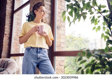 Photo of young happy nice attractive woman look window weekend hold cup smile indoors inside house home