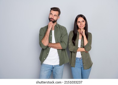 Photo of young husband wife think plan minded look empty space wonder trust isolated over grey color background - Shutterstock ID 2151033237