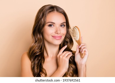 Photo Of Young Lovely Smiling Good Mood Girl With No Clothes Comb Long Wavy Hair Isolated On Beige Color Background