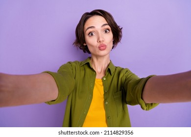 Photo of young lovely woman shoot selfie pouted lips romantic girlfriend isolated over violet color background - Powered by Shutterstock