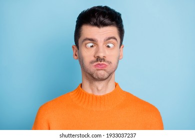 Photo Of Young Man Comic Crazy Dumb Fooling Childish Hold Breath Isolated Over Blue Color Background