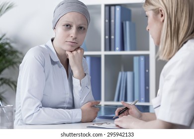 Photo Of Young Pale Cancer Woman With Scarf On Head