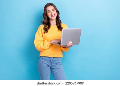 Photo Of Young Positive Pretty Nice Gorgeous Girl Businesswoman Hold Computer Programmer Toothy Smile Successful Isolated On Blue Color Background