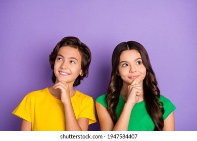 Photo of young preteen kids happy positive smile dream think look empty space isolated over violet color background