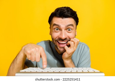 Photo of young pretty funny addicted crazy businessman gaming problem ebetting looking monitor excited good mood isolated on yellow color background - Powered by Shutterstock