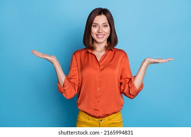 Photo of young pretty lady promoter hold hands solutions scales compare measure advertise isolated over blue color background - Shutterstock ID 2165994831