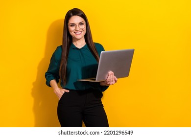 Photo of young pretty woman hold laptop project representative marketer isolated over yellow color background - Powered by Shutterstock