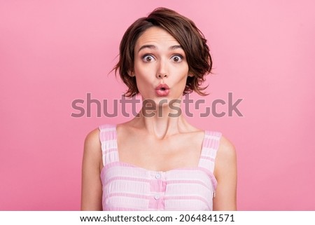 Photo of young pretty woman pouted lips unexpected face reaction fake information isolated over pink color background