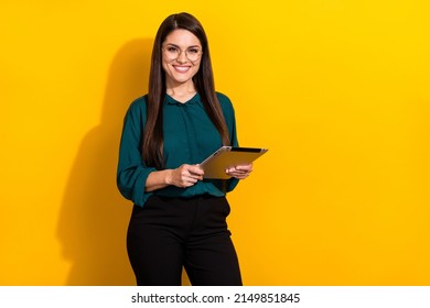 Photo of young pretty woman use tablet ceo boss expert economist isolated over yellow color background - Powered by Shutterstock