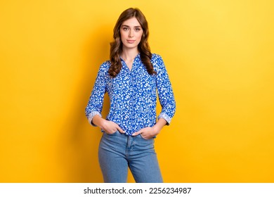 Photo of young rich business owner company woman wear formal outfit blue shirt hands pockets posing confident isolated on yellow color background - Shutterstock ID 2256234987