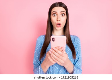 Photo Of Young Shocked Amazed Surprised Girl See Bad Comment Dislike In Social Network Isolated On Pink Color Background