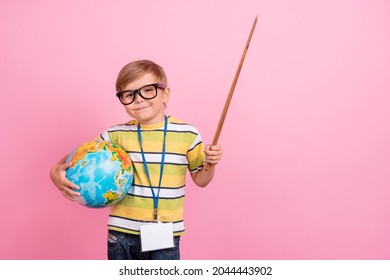 Photo Of Young Small Happy Boy Hold Hand Pointer Stick Globe Lesson Education Isolated On Pink Color Background