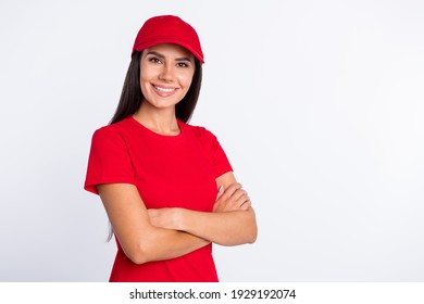 Photo of young smiling lovely confident delivery woman with folded hands professional isolated on grey color background