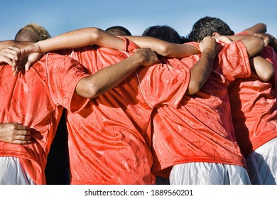 Photo of young soccer players discussing strategy - Powered by Shutterstock