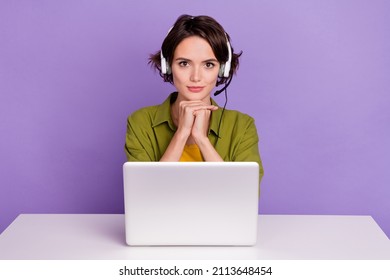 Photo of young woman confident consultant coworking agent headphone speaker isolated over violet color background