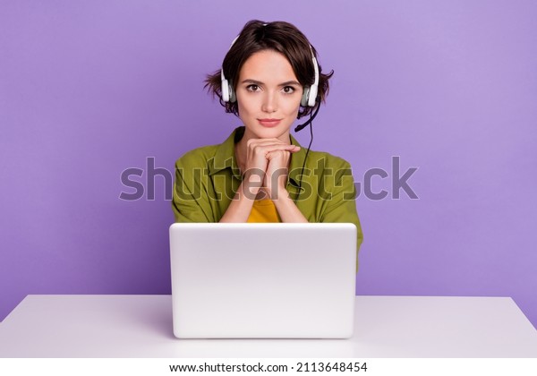 Photo of\
young woman confident consultant coworking agent headphone speaker\
isolated over violet color\
background