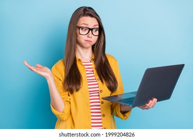 Photo Of Young Woman Hold Breath Cheeks Uncertain Questioned Unsure Report Look Laptop Isolated Over Blue Color Background