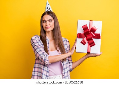 Photo Of Young Woman Unhappy Sad Dislike Refuse Present Box Surprise Birthday Isolated Over Yellow Color Background