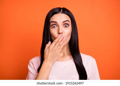 Photo Of Young Worried Girl Hand Palm Covering Mouth Confidential Info Isolate Don Orange Color Background