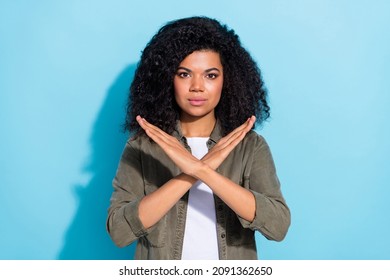 Photo of youth african lady crossed hands show no decline forbidden rule signal isolated over blue color background - Shutterstock ID 2091362650