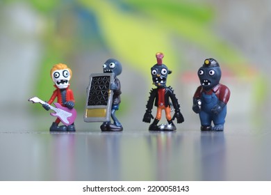 a photo of a zombie children's toy character which is similar to the game plants versus zombies on android.