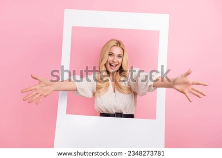 Photo zone picture of young attractive woman blonde curly hair wear white dress hugs you invite party isolated on pink color background