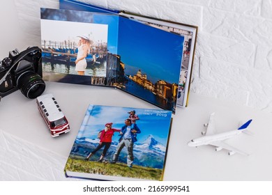 Photobook Album With Travel Photo With Toy Bus And Plane. Photo Book