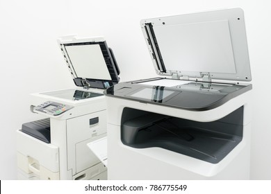 photocopier is a machine that makes paper copies of documents and other visual images ,close-up multi-function device, printer scanner, copier