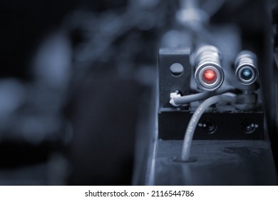 Photoelectric Sensor for distance detection in machine factory. Photo sensor installed in industrial machine. Industrial and Technology concept. - Shutterstock ID 2116544786