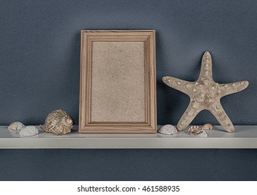 Photoframe With Starfish On Shelf. Toned