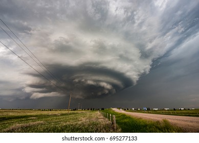 Photogenic mothership supercell storm which had taken on the appearance of a 'cinnamon bun' just outside Harrisburg, Nebraska and from which multiple tornadoes were reported.