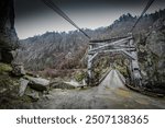 photogragh of historic wood and cable bridge that has been replaced on the Salmon River South of Riggins, ID.