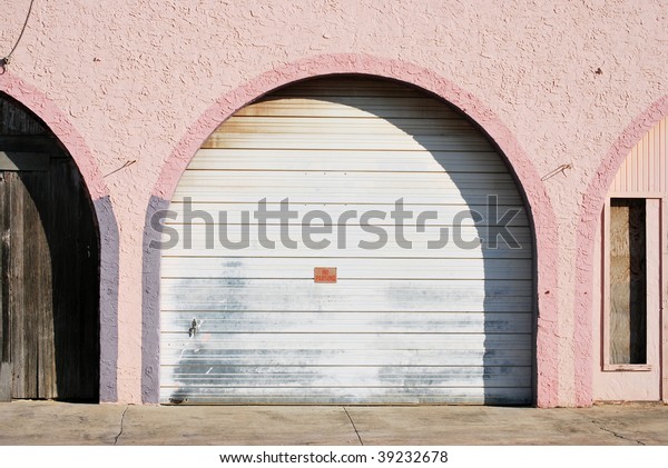 Photograph Arched Garage Door Pink Purple Stock Photo Edit Now