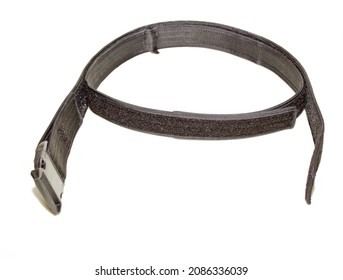 Photograph Of A Black Velcro Strap On A White Background.