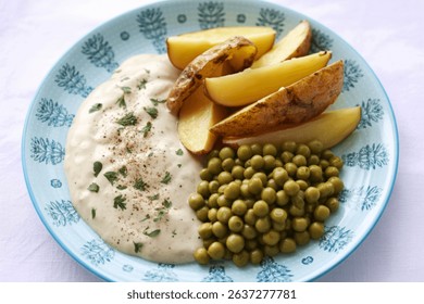 A photograph of a British-style comfort food plate