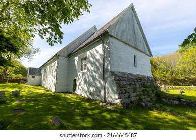 A Photograph Of Dolm Church, A Building From The Norwegian Middle Ages. This Holy Place Is Visited Every Year By Pilgrims. 06.06.2022, Dolmøy, Hitra, Norway