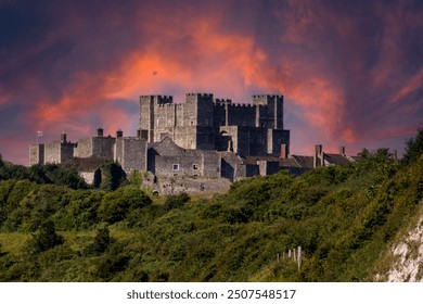 A photograph of Dover Castle with a red sky - Powered by Shutterstock