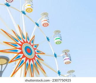 Photograph of the Ferris wheel ride, located in Sunset Park La Libertad, El Salvador. built by president nayib bukele.  - Shutterstock ID 2307750925