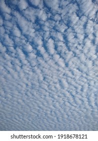 Photograph Framed Towards The Sky Using The Clouds As A Reference Point