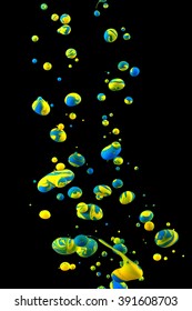 Photograph Of An Ink Drop Forming Color Bubbles Underwater. Liquids Mixing In Dynamic Flow Forming Round Shapes With Vivid Structure. A Detailed Colorful Abstract Design Isolated On Black Background. 