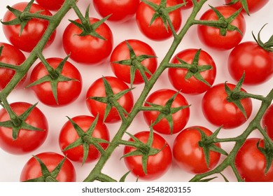 Photograph of many red cherry tomatoes on the vine lying flat. Top view. Vegetables background. Healthy eating concept.  - Powered by Shutterstock