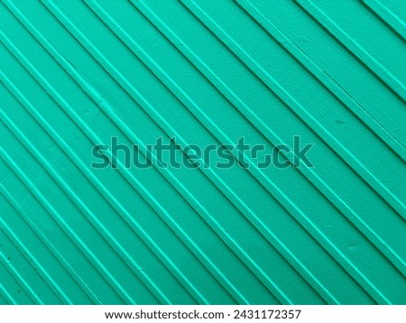 Photograph of a mint or pastel green wall surface with a diagonal pattern. Perfect for backgrounds, presentations, fabric patterns, table runners.