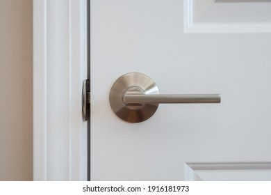 Photograph of a modern styled nickel closet door lever - Shutterstock ID 1916181973