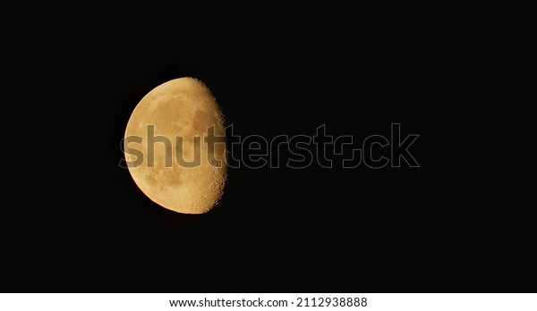 Photograph of\
Moon in the last quarter lunar\
phase.