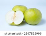 A photograph of a pear cut into pieces on a white background Aonashi Nijisseiki pear
