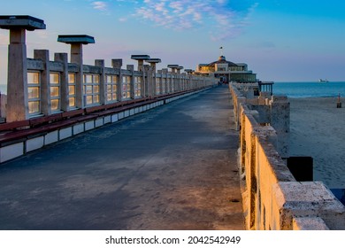 photograph of the pier of blankenberghe (Belgium, North Sea, Belgian coast) taken at sunset in the absence of tourists