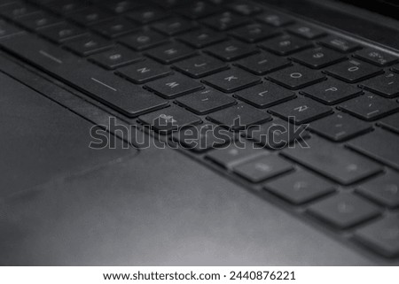 Photograph qwerty laptop keyboard matt black