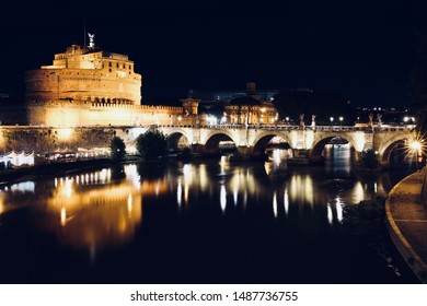 The photograph shows the bridge and the Angel Castle on the Tevere River in Rome.  Rome is beautiful at night.  Photo taken in the summer.