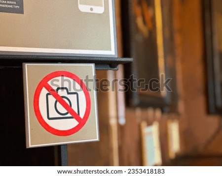 photograph of a sign prohibiting photography